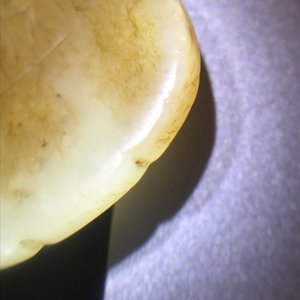 A Chinese russet jade 'Tiger Charm' inscribed pendant, 19/20th C. — photo 7