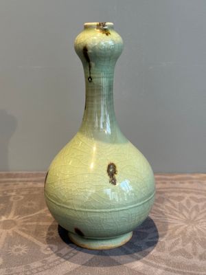 A Chinese russet-splashed Longquan celadon garlic-mouth vase, Yuan/Ming — photo 1