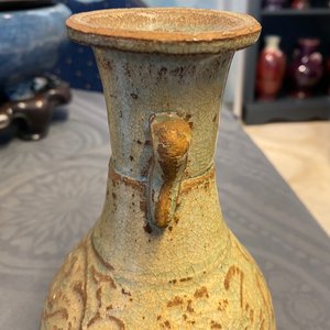 A Chinese sancai ewer and a celadon-glazed bottle vase, Tang and Song — 照片 11