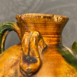 A Chinese sancai ewer and a celadon-glazed bottle vase, Tang and Song — 照片 16