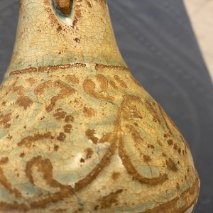 A Chinese sancai ewer and a celadon-glazed bottle vase, Tang and Song — 照片 19