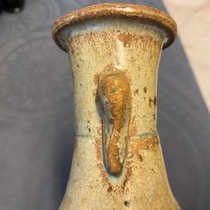 A Chinese sancai ewer and a celadon-glazed bottle vase, Tang and Song — 照片 21