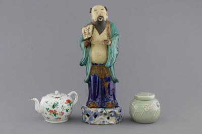 A Chinese sancai-glazed pottery figure, a famille rose teapot and a small ginger jar, 19th C.