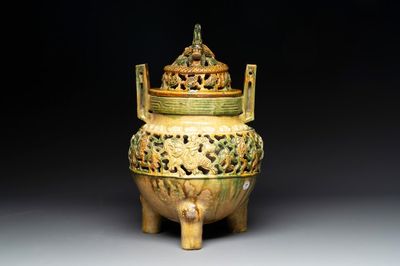 A Chinese sancai-glazed reticulated double-walled tripod censer and cover, Ming
