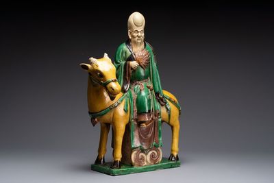 A Chinese sancai-glazed 'Shoulao riding a deer' group, Qing