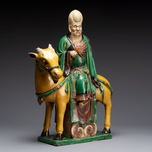 A Chinese sancai-glazed 'Shoulao riding a deer' group, Qing — photo 1