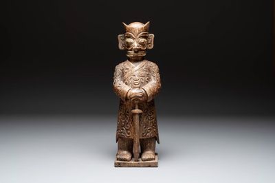 A Chinese Sanxingdui-style marble sculpture of a warrior, 20th C.