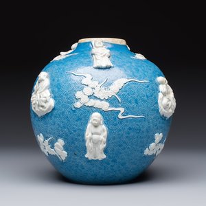 A Chinese sgraffiato blue-ground 'Luohan' vase with relief design, 19th C. — photo 3