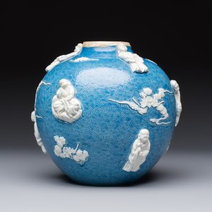 A Chinese sgraffiato blue-ground 'Luohan' vase with relief design, 19th C. — photo 4