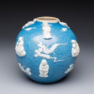 A Chinese sgraffiato blue-ground 'Luohan' vase with relief design, 19th C. — photo 5