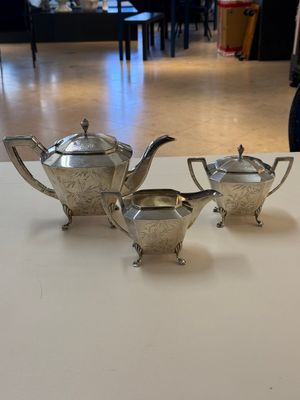 A Chinese silver covered teapot, sugar jar and milk jug with bamboo design, Tackhing 90% silver mark, 20th C. — photo 1