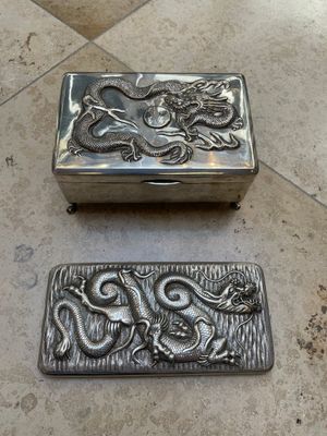 A Chinese silver 'dragon' box and a tobacco box, Sheng chang 昇昌 mark, 19th C. — photo 1