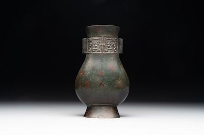 A Chinese silver-inlaid bronze arrow vase with Taotie design, 'touhu 投壺', Ming