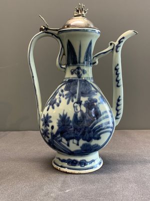 A Chinese silver-mounted blue and white ewer with figures in a landscape, Ming — photo 1