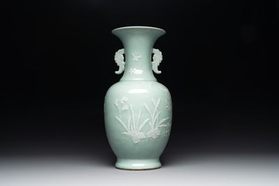 A Chinese slip-decorated celadon-glazed vase with floral design, Qianlong mark and of the period