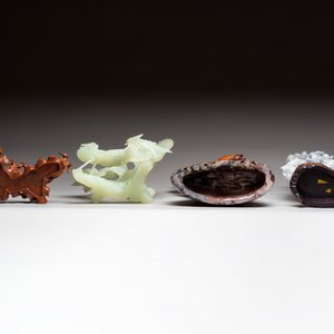 A Chinese soapstone vase with stand and two jadeite carvings on wooden stands, 19/20th C. — photo 6