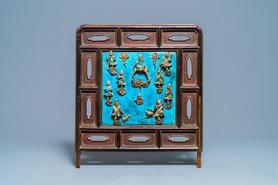 A Chinese square fahua 'Immortals' plaque mounted in a wooden table screen, Ming
