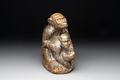 A Chinese stone group of two monkeys, 20th C.
