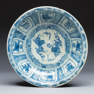 A Chinese Swatow blue and white 'Dragons' dish, Ming