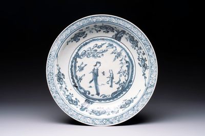 A Chinese Swatow blue and white 'lady and a boy' dish, Ming