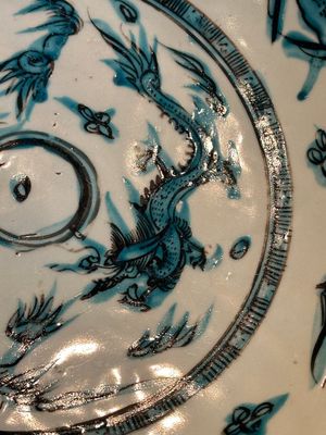 A Chinese Swatow slip-decorated blue-glazed 'chrysanthemum' dish and a turquoise- and black-enamelled 'dragon' dish, Ming — photo 14