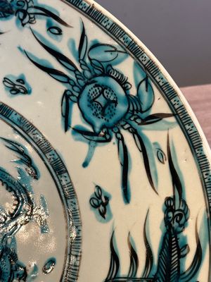 A Chinese Swatow slip-decorated blue-glazed 'chrysanthemum' dish and a turquoise- and black-enamelled 'dragon' dish, Ming — photo 15