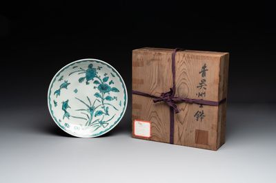 A Chinese Swatow turquoise- and black-enamelled 'carp, narcissus and chrysanthemum' plate and a tomobako, Ming