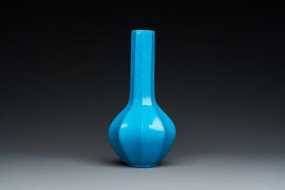 A Chinese turquoise blue Peking glass facetted bottle vase, Qianlong mark and of the period