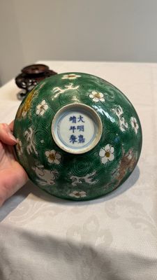 A Chinese verte biscuit 'animals among waves' bowl and a wooden stand, Jiajing mark, Kangxi — photo 11