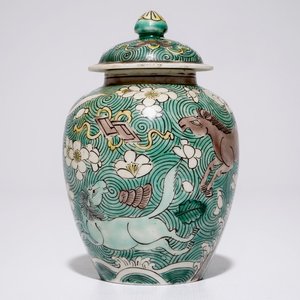 A Chinese verte biscuit covered jar with horses, Kangxi — photo 1