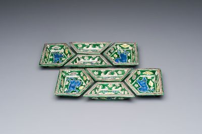 A Chinese verte biscuit eight-piece sweetmeat set with flying horses, 19th C.