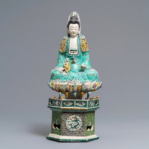 A Chinese verte biscuit group of Guanyin with child on a lotus throne, Kangxi — photo 1