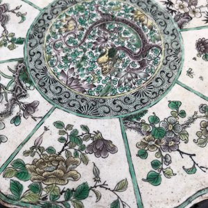 A Chinese verte biscuit lotus-shaped dragon plaque mounted in a wooden stand, Kangxi — photo 14