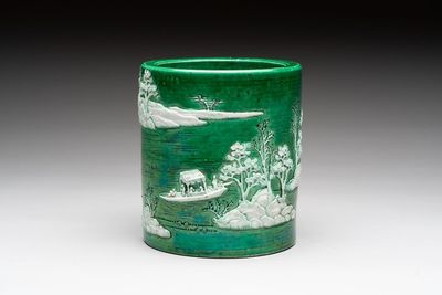 A Chinese verte biscuit 'riverscape' brush pot, artemisia leaf mark, 19th C.
