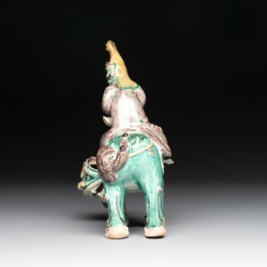 A Chinese verte biscuit 'Sogdian riding a Buddhist lion' group, 19th C. — photo 2