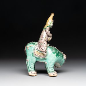A Chinese verte biscuit 'Sogdian riding a Buddhist lion' group, 19th C. — photo 3