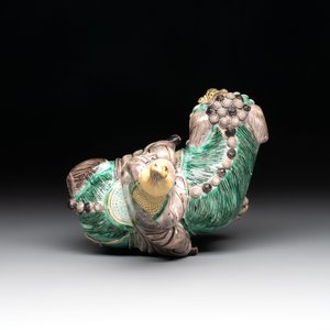 A Chinese verte biscuit 'Sogdian riding a Buddhist lion' group, 19th C. — photo 6