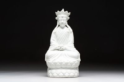 A Chinese white-glazed figure of Xuanzang, Cai Chang Tai 蔡昌泰造 mark, 20th C.