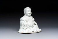 A Chinese white-glazed Milefo Buddha, 19th C.