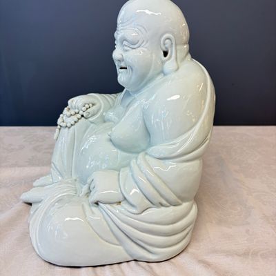 A Chinese white-glazed Milefo Buddha on a gilt-lacquered wooden lotus throne — photo 12