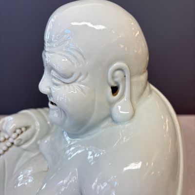 A Chinese white-glazed Milefo Buddha on a gilt-lacquered wooden lotus throne — photo 13
