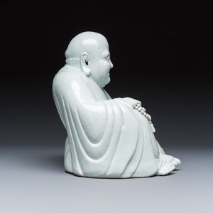 A Chinese white-glazed Milefo Buddha on a gilt-lacquered wooden lotus throne — photo 6