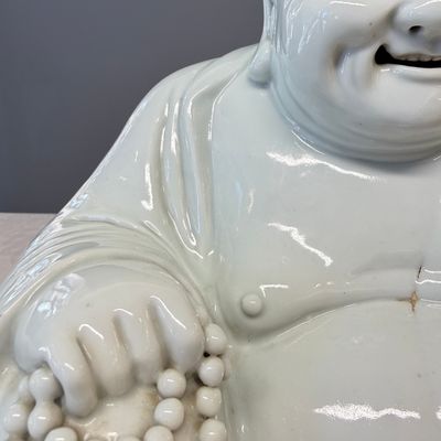 A Chinese white-glazed Milefo Buddha on a gilt-lacquered wooden lotus throne — photo 5