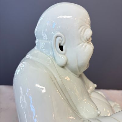 A Chinese white-glazed Milefo Buddha on a gilt-lacquered wooden lotus throne — photo 21