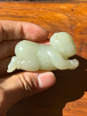 A Chinese white jade carving of a reclining boy, Qing — photo 3