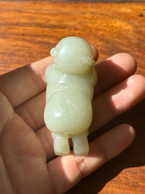 A Chinese white jade carving of a reclining boy, Qing — photo 5