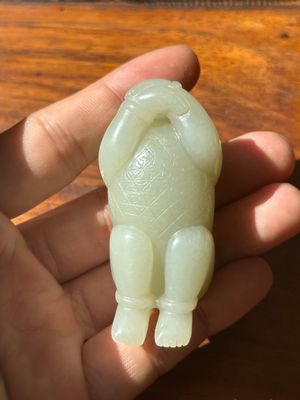 A Chinese white jade carving of a reclining boy, Qing — photo 6