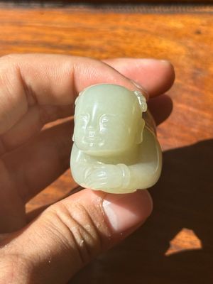 A Chinese white jade carving of a reclining boy, Qing — photo 7