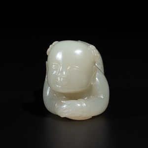 A Chinese white jade carving of a reclining boy, Qing — photo 2