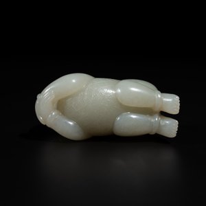 A Chinese white jade carving of a reclining boy, Qing — photo 6